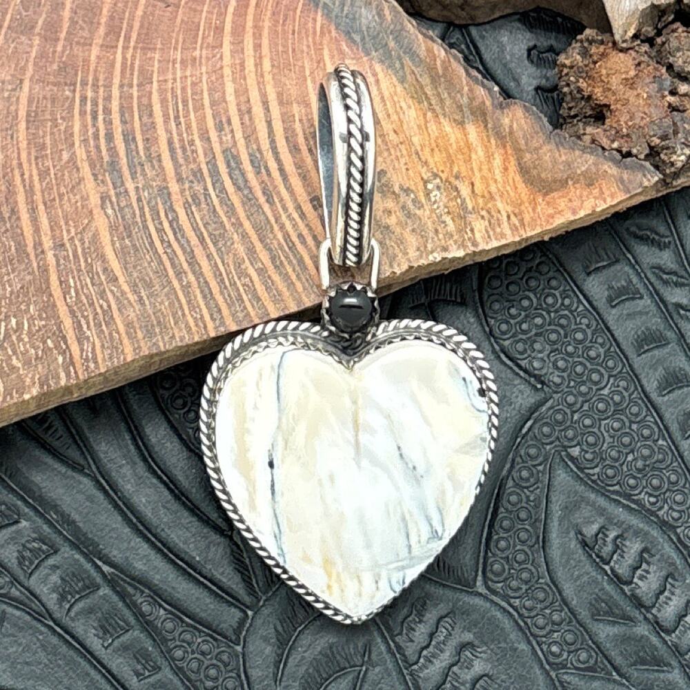 BUFFALO DANCER Taos Pueblo Sterling Silver White Buffalo Heart Pendant With Onyx